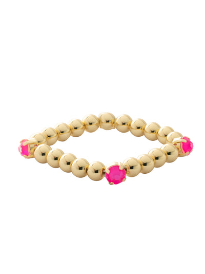 Four Crystal Stretch Bracelet - 4BFJ22BGETP - <p>The Four Crystal Stretch Bracelet features repeating metal beads and four round cut crystals on a multi-layered stretchy jewelry filament, creating a durable and trendy piece. From Sorrelli's Electric Pink collection in our Bright Gold-tone finish.</p>