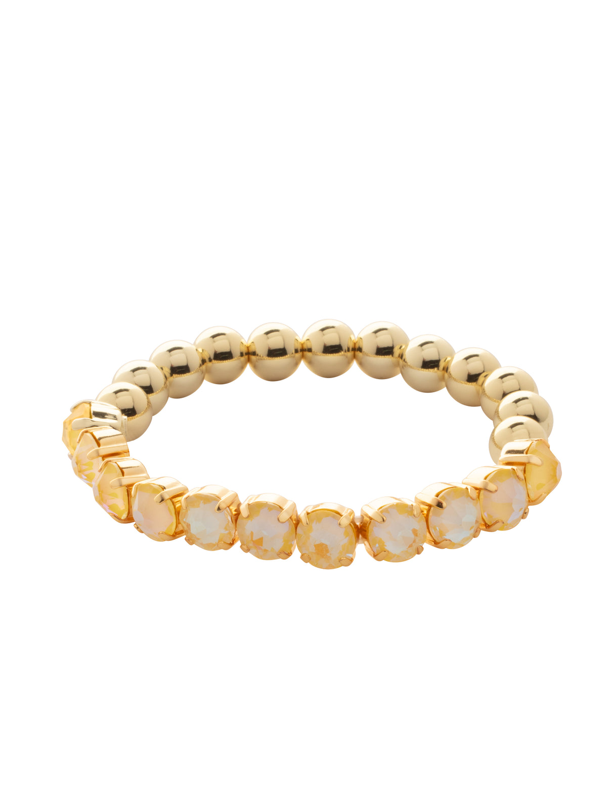 Crystal Zola Stretch Bracelet - 4BFJ40BGLTD - <p>Crystal Zola Stretch Bracelet features a side of repeating metal beads and a side of round cut crystals on a multi-layered stretchy jewelry filament, creating a durable and trendy piece. From Sorrelli's Light Topaz Delite collection in our Bright Gold-tone finish.</p>