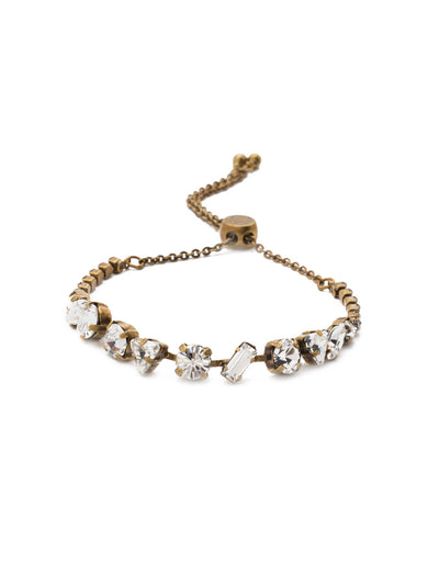 Cherished Slider Bracelet - BEK19AGCRY - <p>One shape doesn't have to fit all. Go for versatility with crystals of all kinds in a slider you can match to any outfit. Slider bracelet closure. From Sorrelli's Crystal collection in our Antique Gold-tone finish.</p>