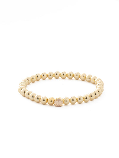 Mini Single Crystal Stretch Bracelet - BFN33BGDCH - <p>The Mini Single Crystal Stretch Bracelet features repeating metal beads and a single round cut crystal on a multi-layered stretchy jewelry filament, creating a durable and trendy piece. From Sorrelli's Dark Champagne collection in our Bright Gold-tone finish.</p>