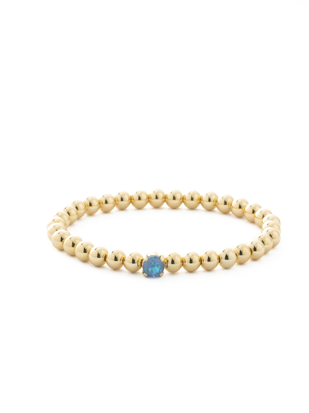 Mini Single Crystal Stretch Bracelet - BFN33BGOCD - <p>The Mini Single Crystal Stretch Bracelet features repeating metal beads and a single round cut crystal on a multi-layered stretchy jewelry filament, creating a durable and trendy piece. From Sorrelli's Ocean Delite collection in our Bright Gold-tone finish.</p>