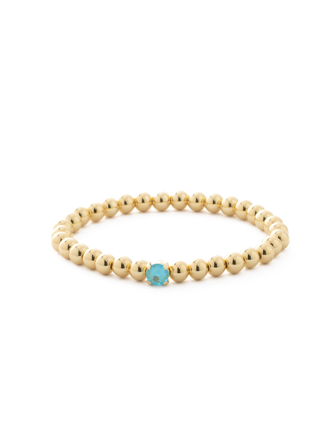 Mini Single Crystal Stretch Bracelet - BFN33BGSBD - <p>The Mini Single Crystal Stretch Bracelet features repeating metal beads and a single round cut crystal on a multi-layered stretchy jewelry filament, creating a durable and trendy piece. From Sorrelli's Summer Blue Delite collection in our Bright Gold-tone finish.</p>