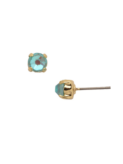 Jayda Stud Earrings - EDN32BGSBD - <p>The Jayda Stud Earrings are the perfect every day wardrobe staple. A round crystal nestles perfectly in a metal plated post with four prongs. </p><p>Need help picking a stud? <a href="https://www.sorrelli.com/blogs/sisterhood/round-stud-earrings-101-a-rundown-of-sizes-styles-and-sparkle">Check out our size guide!</a> From Sorrelli's Summer Blue Delite collection in our Bright Gold-tone finish.</p>