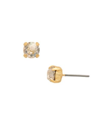 Jayda Stud Earrings - EDN32MGGGO - <p>The Jayda Stud Earrings are the perfect every day wardrobe staple. A round crystal nestles perfectly in a metal plated post with four prongs. </p><p>Need help picking a stud? <a href="https://www.sorrelli.com/blogs/sisterhood/round-stud-earrings-101-a-rundown-of-sizes-styles-and-sparkle">Check out our size guide!</a> From Sorrelli's Golden Goddess collection in our Matte Gold-tone finish.</p>