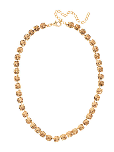 Matilda Tennis Necklace - NFJ4BGDCH - <p>The Matilda Tennis Necklace features a repeating line of round cut crystals on an adjustable chain, secured with a lobster claw clasp. From Sorrelli's Dark Champagne collection in our Bright Gold-tone finish.</p>