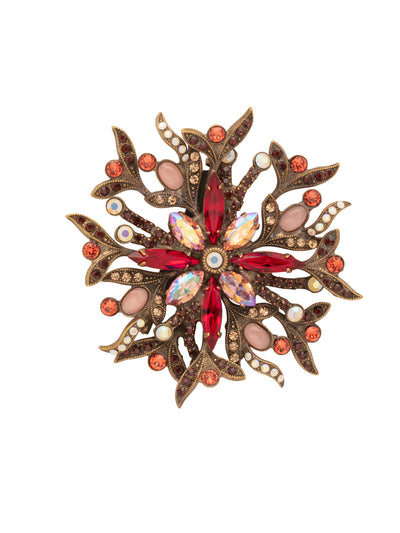 Dazzling Dahlia Pin - PBA2AGCNS - <p>An intricate floral design that features four large marquis cut crystals and a myriad of smaller stlnes on scrolled petals. From Sorrelli's Cinnamon Stick collection in our Antique Gold-tone finish.</p>