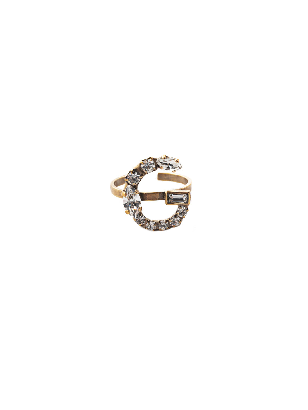 G Initial Statement Ring - REH46AGCRY - <p>The initial statement ring makes a great gift for someone you love…AND for yourself! An assortment of crystals embellish a single letter charm, sitting prominently in the center of an adjustable ring band. Pair it with the initial pendant necklace to create your own look! From Sorrelli's Crystal collection in our Antique Gold-tone finish.</p>