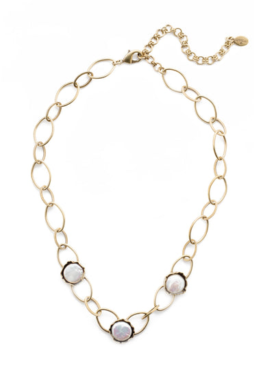 Nairobi Tennis Necklace - 4NEU1AGMDP - <p>The Nairobi Tennis Necklace features three freshwater pearls framed in edgy handcrafted metalwork. The perfect twist on a classic look. From Sorrelli's Modern Pearl collection in our Antique Gold-tone finish.</p>