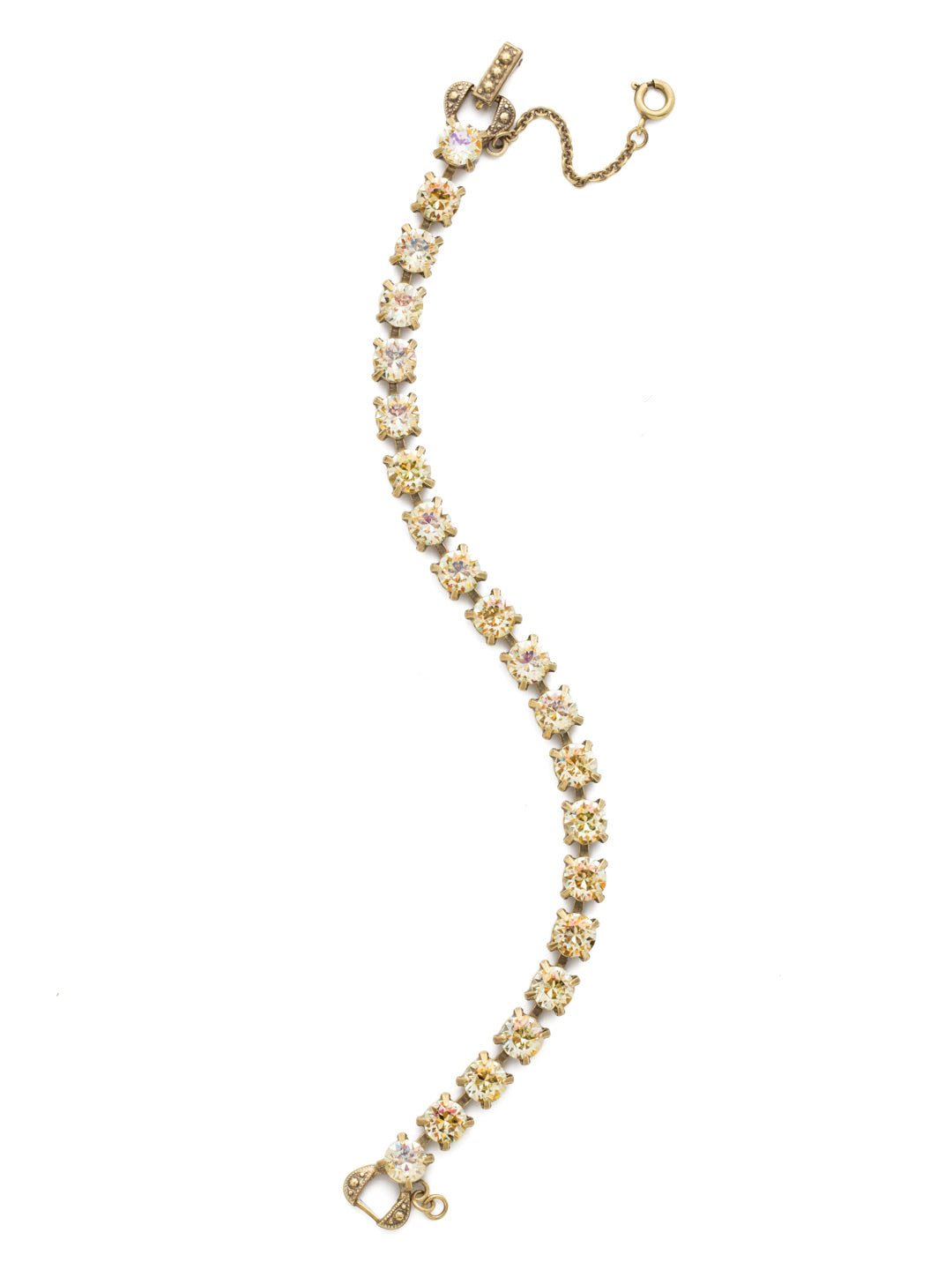 Repeating Round Tennis Bracelet - BCZ36AGCCH - <p>Understated elegance. Repeating round crystals create a delicate strand of sparkle suited for anyone's style. From Sorrelli's Crystal Champagne collection in our Antique Gold-tone finish.</p>