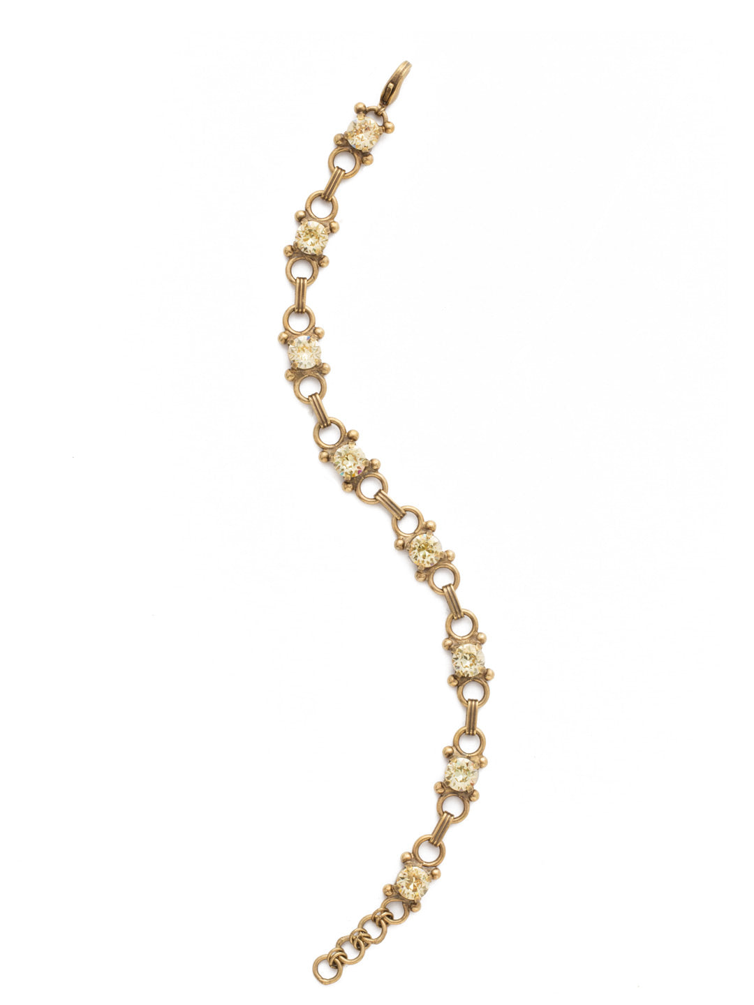 Mini Eyelet Line Bracelet Tennis Bracelet - BDH5AGCCH - <p>Our mini Eyelet Line Bracelet offers a classic design with edgy elements. Add this line bracelet to any look for just enough sparkle. From Sorrelli's Crystal Champagne collection in our Antique Gold-tone finish.</p>