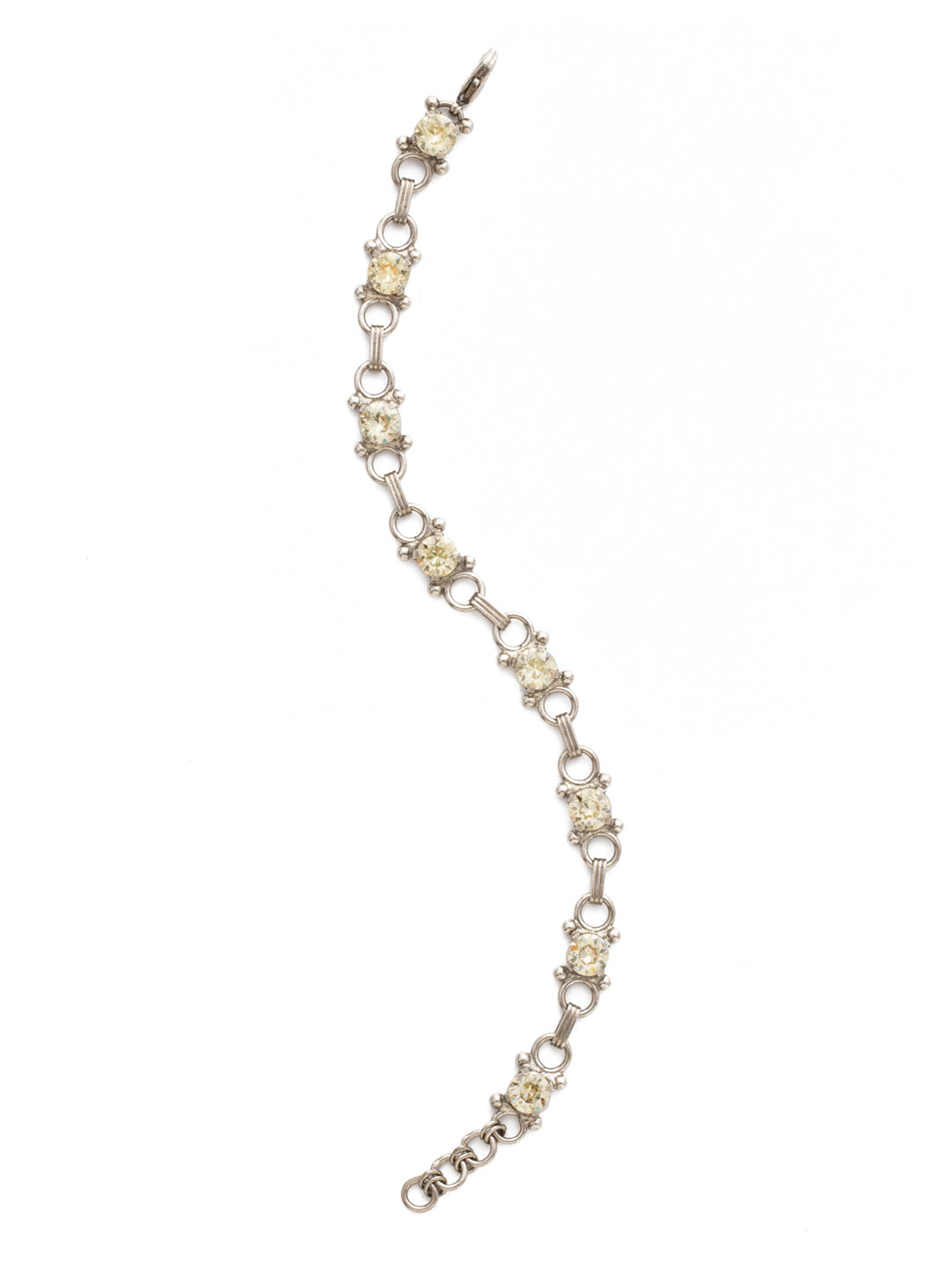 Mini Eyelet Line Bracelet Tennis Bracelet - BDH5ASCCH - <p>Our mini Eyelet Line Bracelet offers a classic design with edgy elements. Add this line bracelet to any look for just enough sparkle. From Sorrelli's Crystal Champagne collection in our Antique Silver-tone finish.</p>