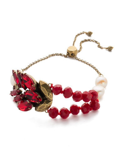 Viserion Slider Bracelet - BEF11AGSNR - <p>An arrow line of crystals shooting down the chain ending with delicately placed bead, this bracelet is perfect for a night on the town and can be easily adjusted to create your own ideal fit. From Sorrelli's Sansa Red collection in our Antique Gold-tone finish.</p>