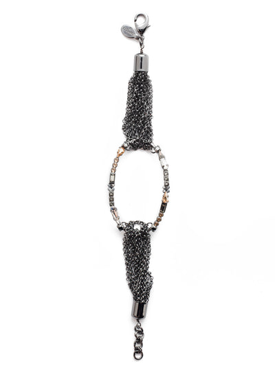 Ruth Statement Bracelet - BEU5GMGNS - Feeling a bit edgy? Put on the Ruth Statement Bracelet featuring multi-strand metalwork and a circular center encrusted in sparkling crystals. From Sorrelli's Golden Shadow collection in our Gun Metal finish.