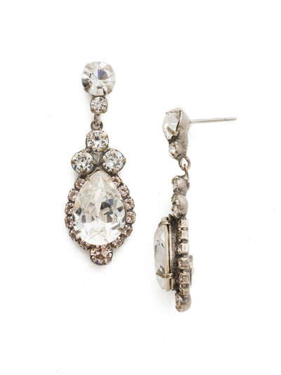 Central Teardrop Dangle Earrings - EDA55ASSNB - <p>Drops of dazzle! A teardrop shaped crystal surrounded by rhinestones dangle from a round crystal post. From Sorrelli's Snow Bunny collection in our Antique Silver-tone finish.</p>