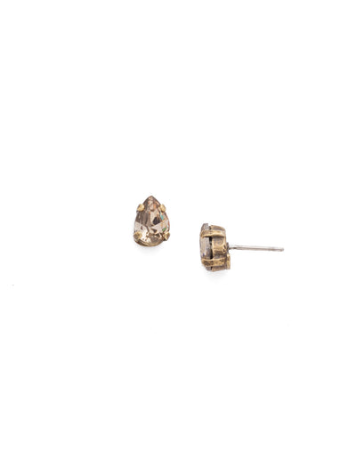 Perrie Stud Earrings - EDJ19AGNT - <p>Our Mini Pear Cut Post Earrings keep it casual while still bringing on the bling. A teardrop gemstone enclosed in brass detail offers casual yet edgy adornment. From Sorrelli's Neutral Territory collection in our Antique Gold-tone finish.</p>