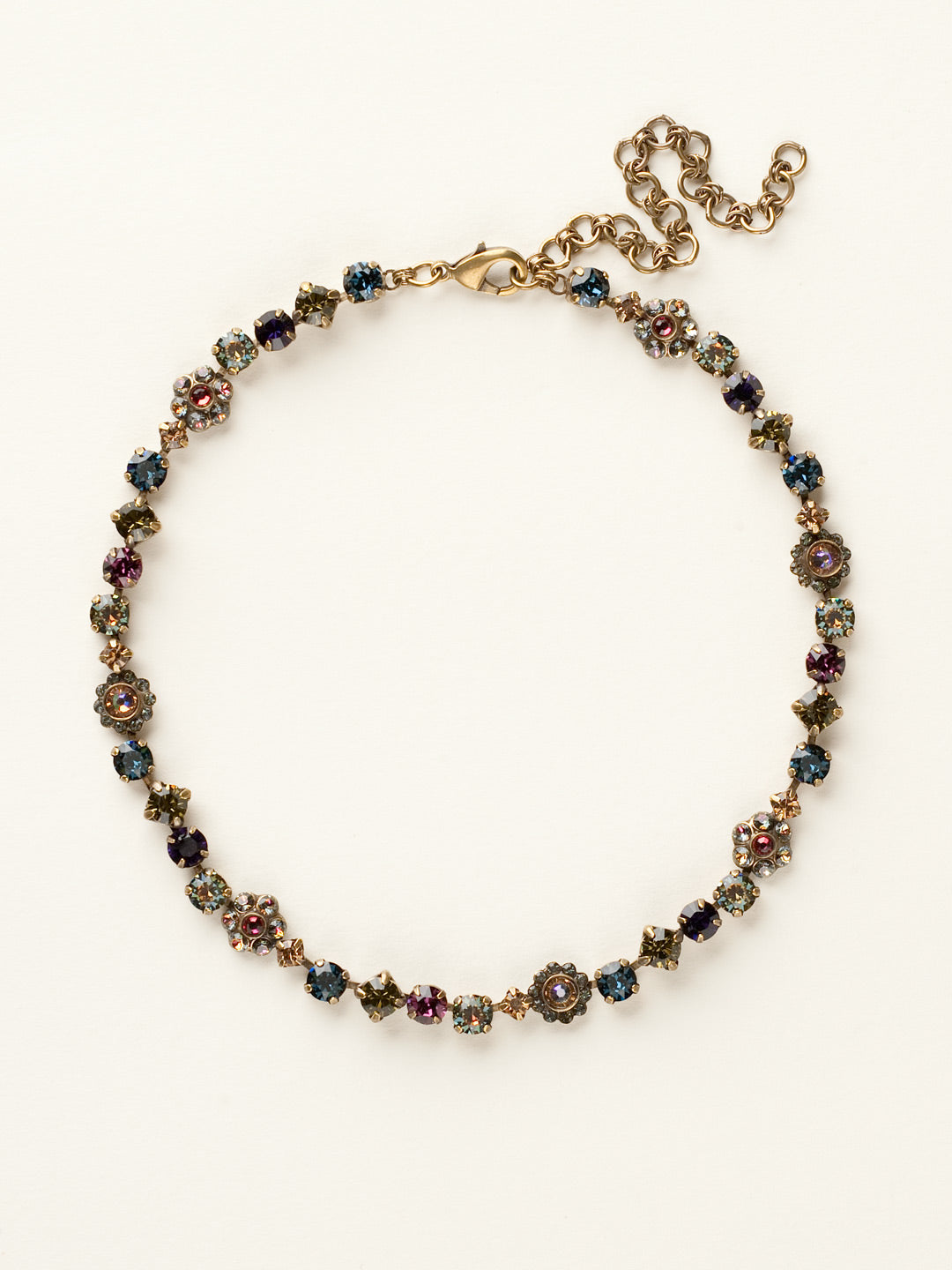 Classic Floral Tennis Necklace - NBE2AGAUS - <p>Put an extra spring in your step! This classic necklace features a combination of round and floral cluster crystals to add a sweet romantic touch to your everyday look. From Sorrelli's Aurora Sky collection in our Antique Gold-tone finish.</p>