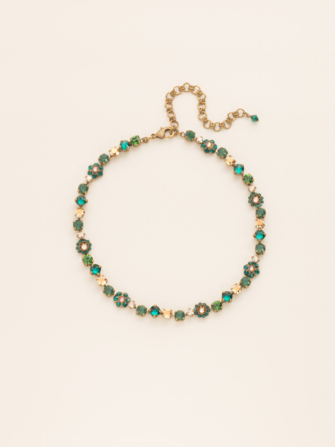 Classic Floral Tennis Necklace - NBE2AGWFN - <p>Put an extra spring in your step! This classic necklace features a combination of round and floral cluster crystals to add a sweet romantic touch to your everyday look. From Sorrelli's Wild Fern collection in our Antique Gold-tone finish.</p>