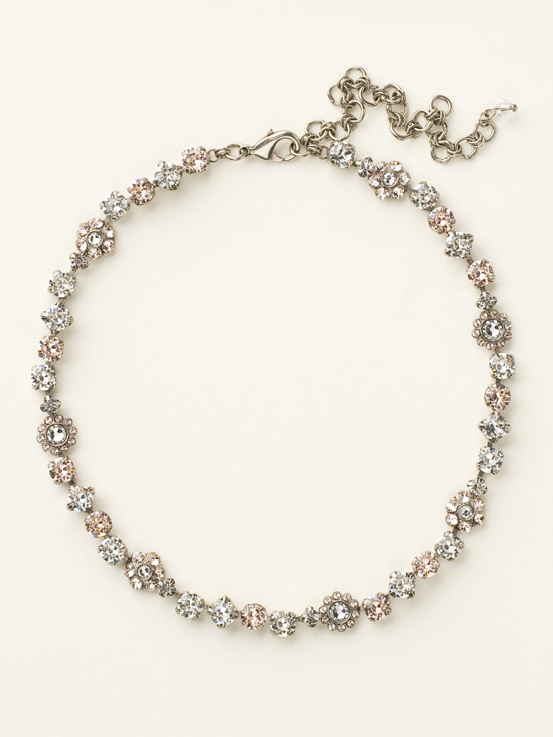 Classic Floral Tennis Necklace - NBE2ASCCL - <p>Put an extra spring in your step! This classic necklace features a combination of round and floral cluster crystals to add a sweet romantic touch to your everyday look. From Sorrelli's Crystal Clear collection in our Antique Silver-tone finish.</p>