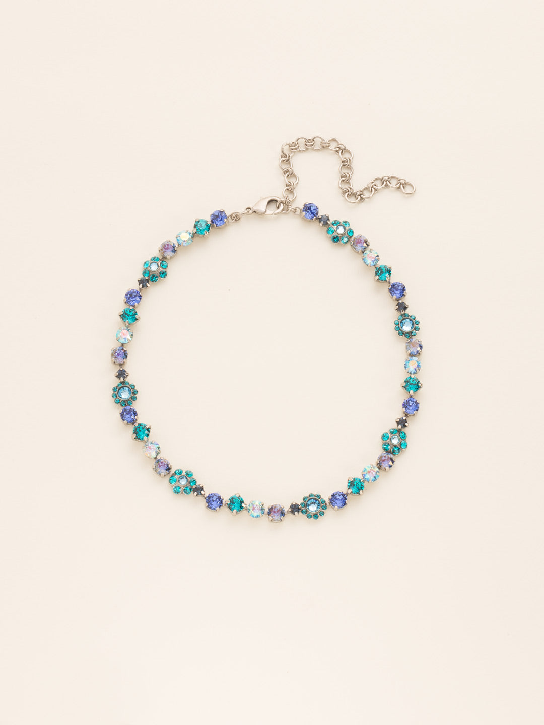 Classic Floral Tennis Necklace - NBE2ASEB - <p>Put an extra spring in your step! This classic necklace features a combination of round and floral cluster crystals to add a sweet romantic touch to your everyday look. From Sorrelli's Electric Blue collection in our Antique Silver-tone finish.</p>