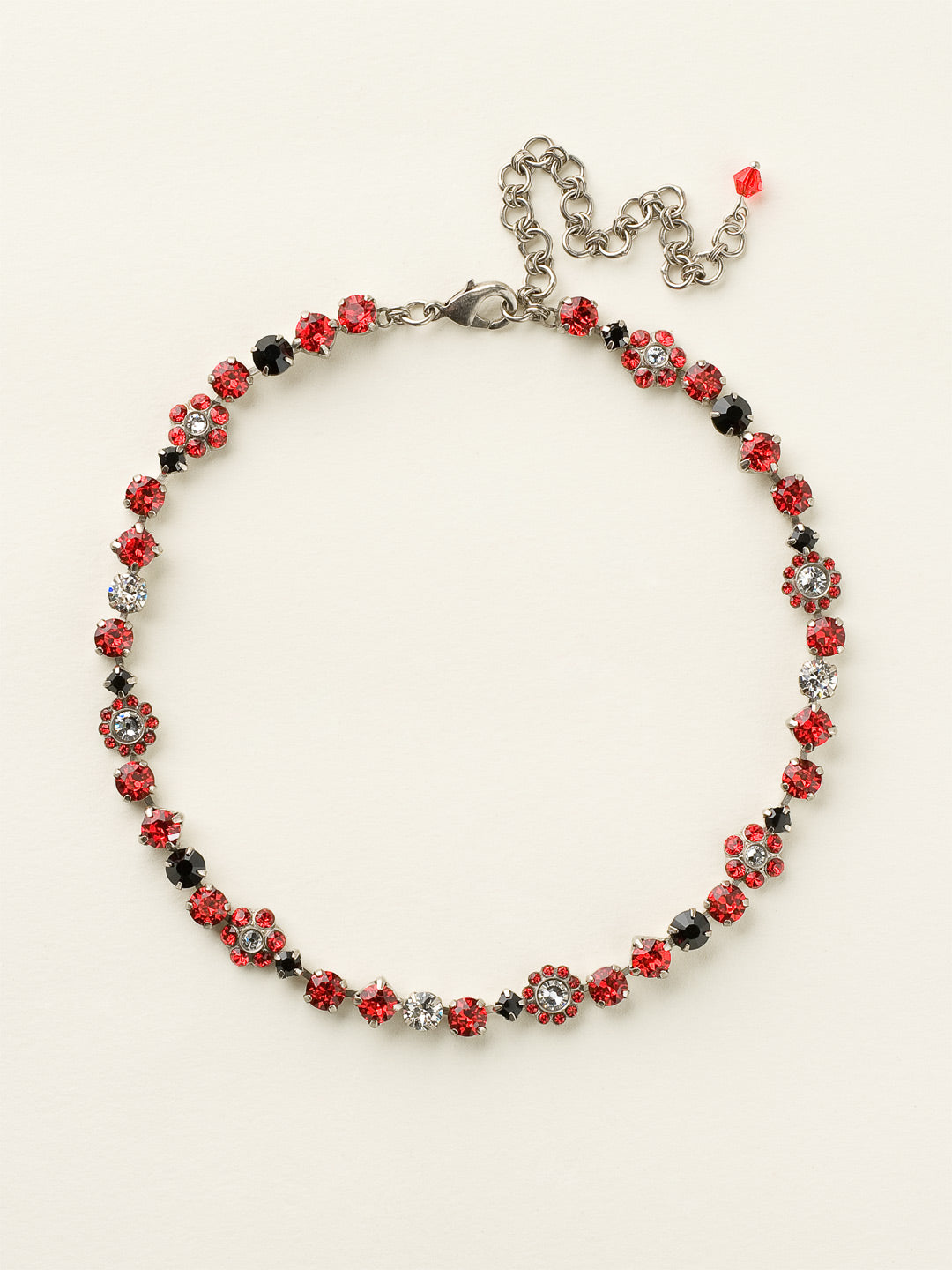 Classic Floral Tennis Necklace - NBE2ASGDAR - <p>Put an extra spring in your step! This classic necklace features a combination of round and floral cluster crystals to add a sweet romantic touch to your everyday look. From Sorrelli's Game Day Red collection in our Antique Silver-tone finish.</p>