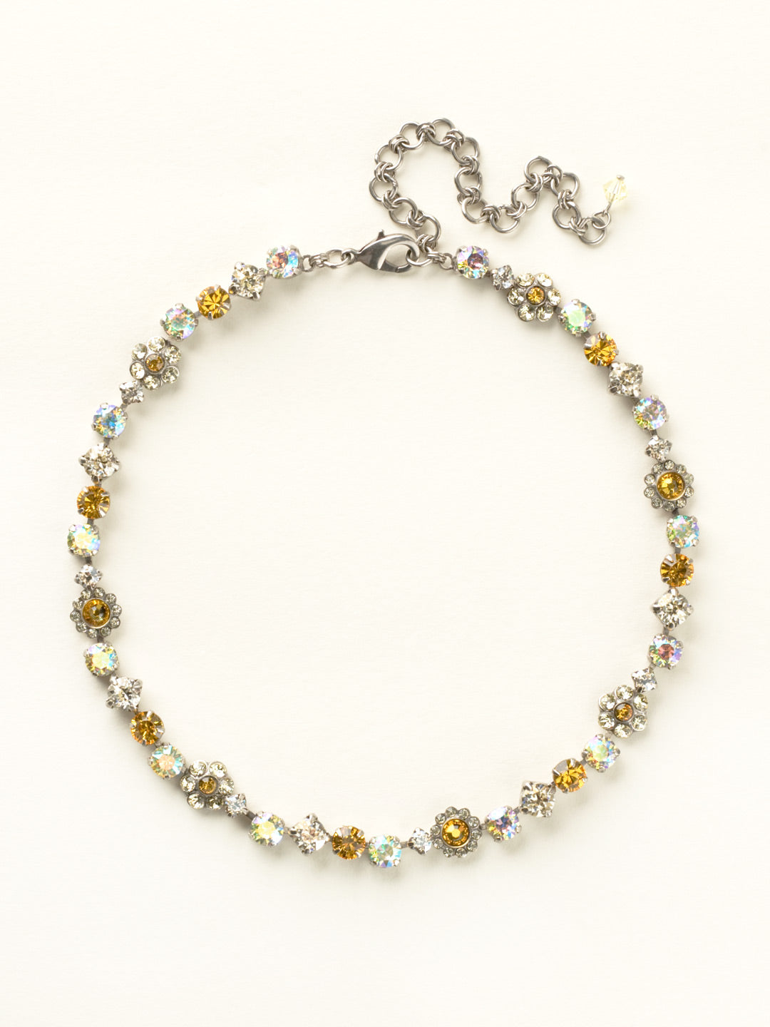 Classic Floral Tennis Necklace - NBE2ASLMD - <p>Put an extra spring in your step! This classic necklace features a combination of round and floral cluster crystals to add a sweet romantic touch to your everyday look. From Sorrelli's Lemonade collection in our Antique Silver-tone finish.</p>