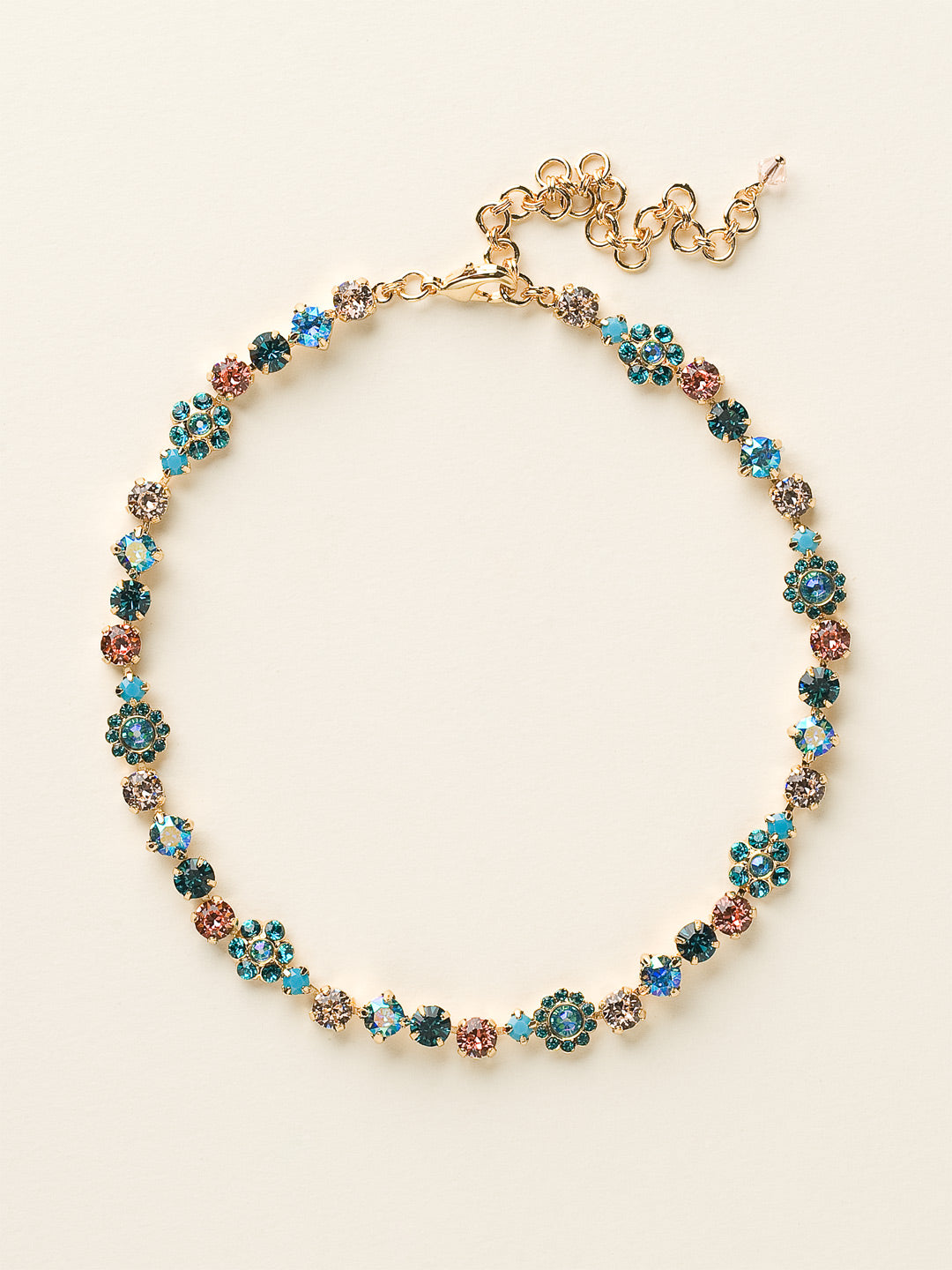 Classic Floral Tennis Necklace - NBE2BGCCO - <p>Put an extra spring in your step! This classic necklace features a combination of round and floral cluster crystals to add a sweet romantic touch to your everyday look. From Sorrelli's Caribbean Coral collection in our Bright Gold-tone finish.</p>