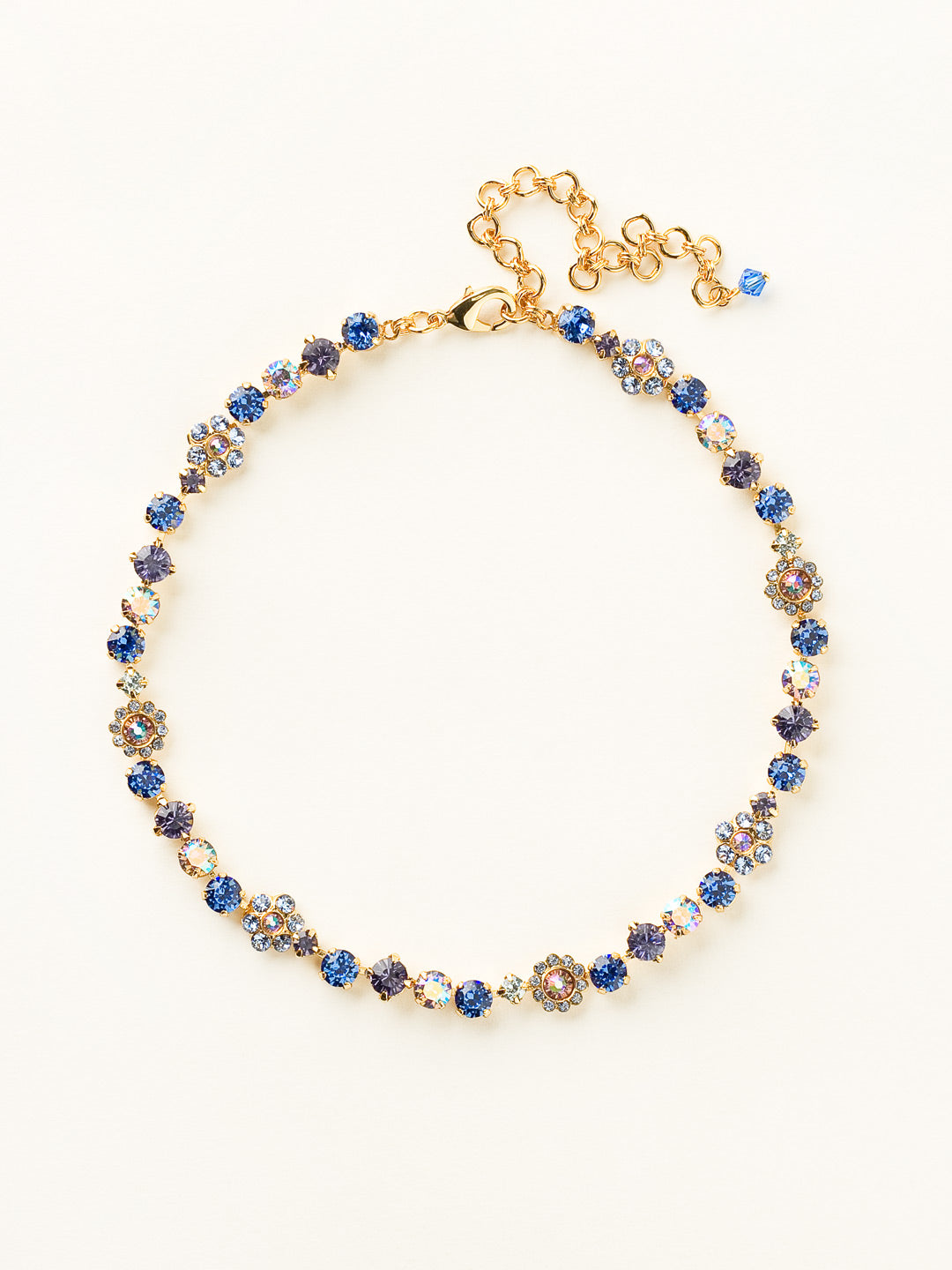 Classic Floral Tennis Necklace - NBE2BGSS - <p>Put an extra spring in your step! This classic necklace features a combination of round and floral cluster crystals to add a sweet romantic touch to your everyday look. From Sorrelli's Sweet Sapphire collection in our Bright Gold-tone finish.</p>