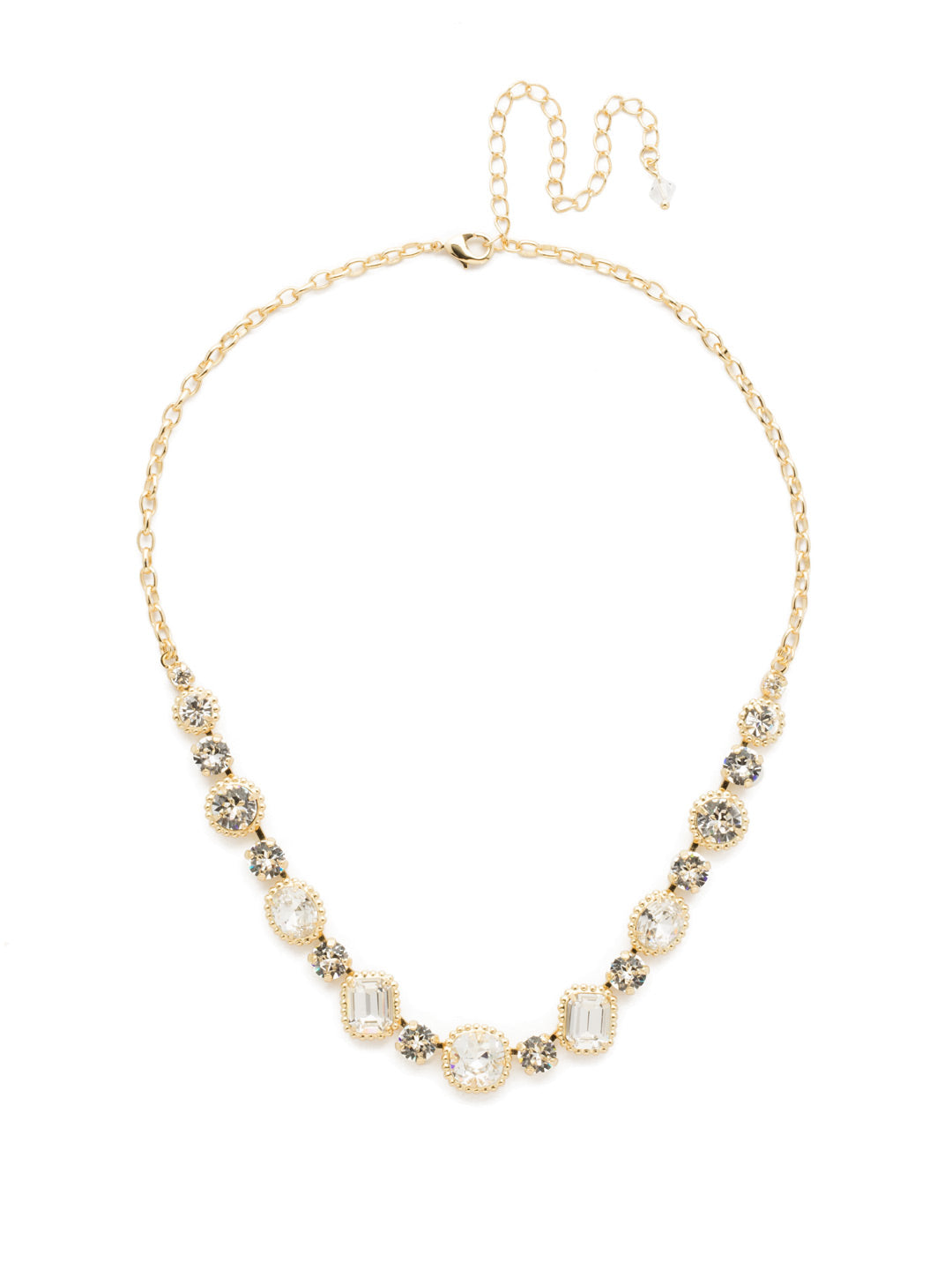 Embellished Elegance Necklace - NDK14BGCRY - This glimmering line necklace features rounded cushion cut, oval and emerald cut stones surrounded by embellished, vintage inspired settings.