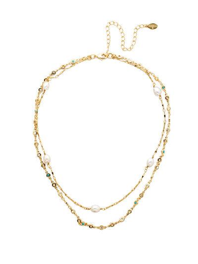 Ravenna Layered Necklace - NEC10BGPLP - <p>Ready to wear! This multi-strand classic line necklace features natural shining pearls and detailed metal chains. From Sorrelli's Polished Pearl collection in our Bright Gold-tone finish.</p>