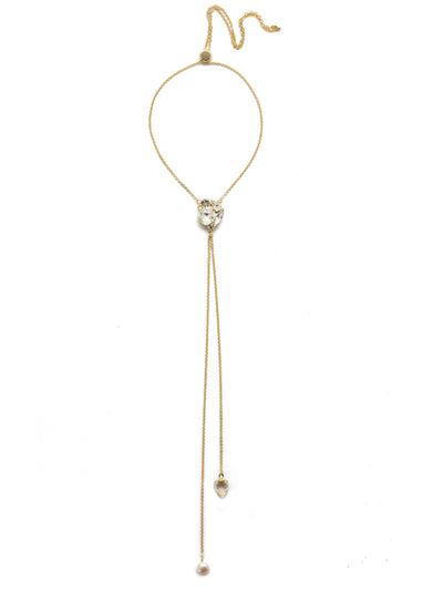 NEL44 Statement Necklace - NEL44BGMDP - This adjustable long strand necklace features two strands delicatily hanging from a cluster of cyrstal. From Sorrelli's Modern Pearl collection in our Bright Gold-tone finish.