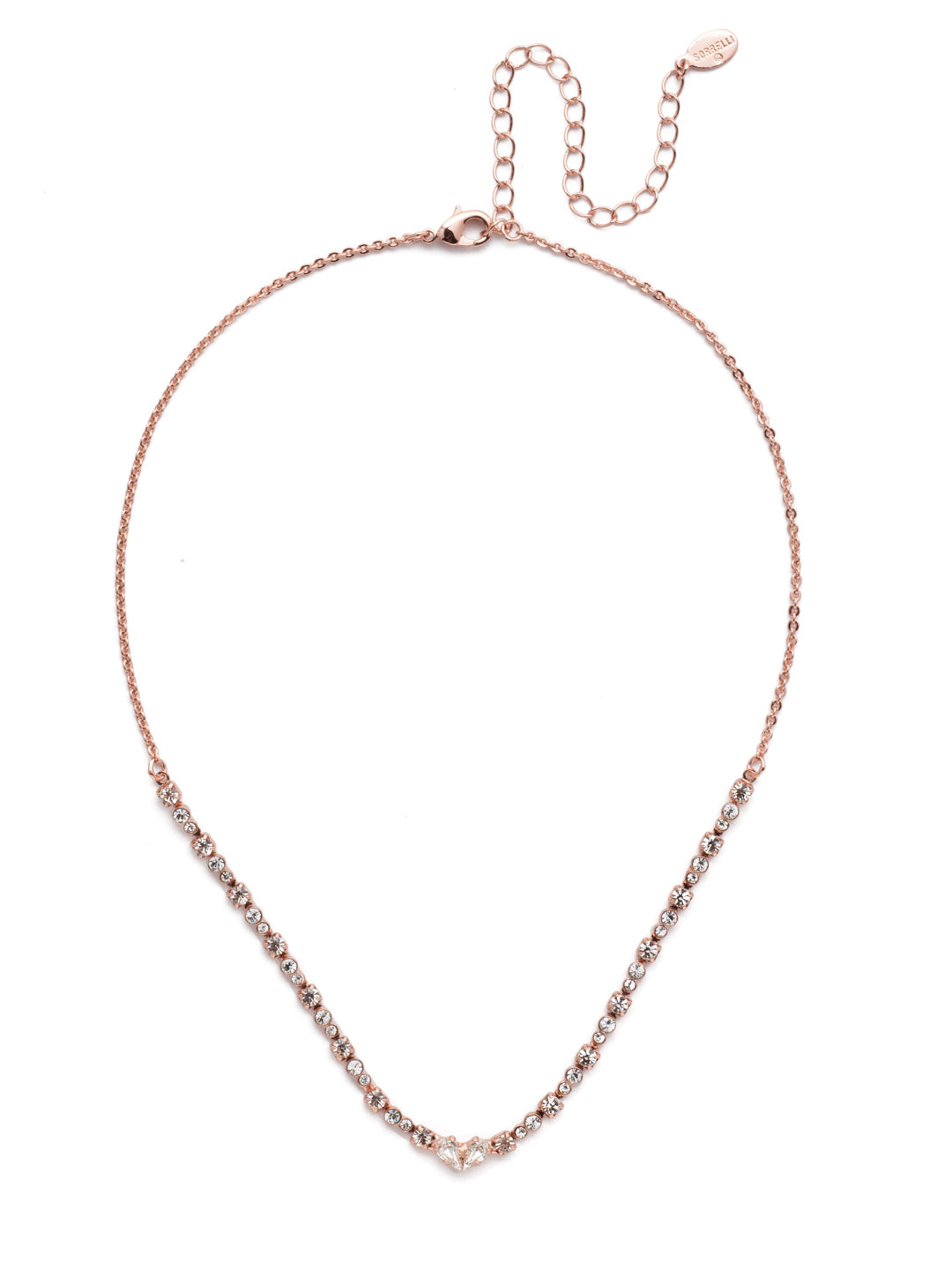 Waverly Tennis Necklace - NER7RGCRY - <p>The Waverly Tennis Necklace is a subtle-yet-stunning piece. Its round crystal pieces are joined by a heart-shaped center. It's a quiet classic you can wear to play up a casual outfit or put on for a night out. From Sorrelli's Crystal collection in our Rose Gold-tone finish.</p>