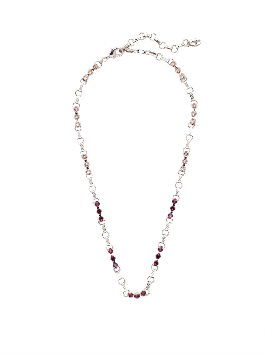 Patrice Tennis Necklace - NEZ2PDSIP - The prongless style of the Patrice Tennis Necklace is the hottest new Sorrelli staple. Alternating stud crystals and chain links are secured with a lobster clasp. From Sorrelli's Sienna Plum collection in our Palladium finish.