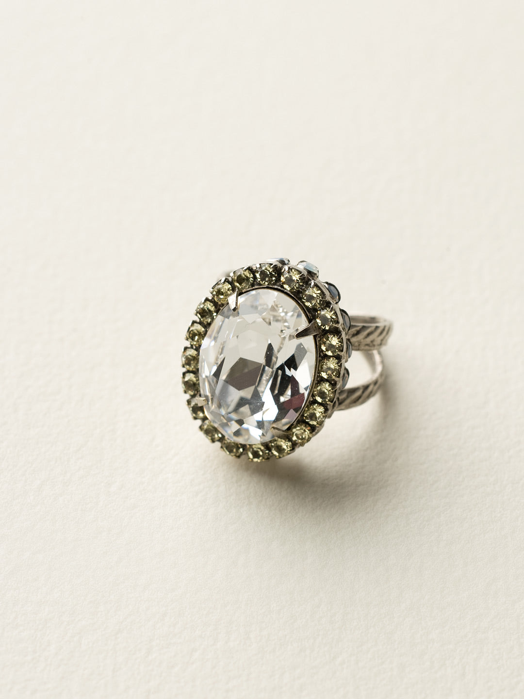 Glamorous Oval-Cut Cocktail Ring - RBT68ASLZ - <p>A jewelry collection must! This glamorous ring features a bold oval cut center crystal surrounded by crystal accents that sits on a braided band to create an antique classic. Ring size: 7 (US) From Sorrelli's Lemon Zest collection in our Antique Silver-tone finish.</p>