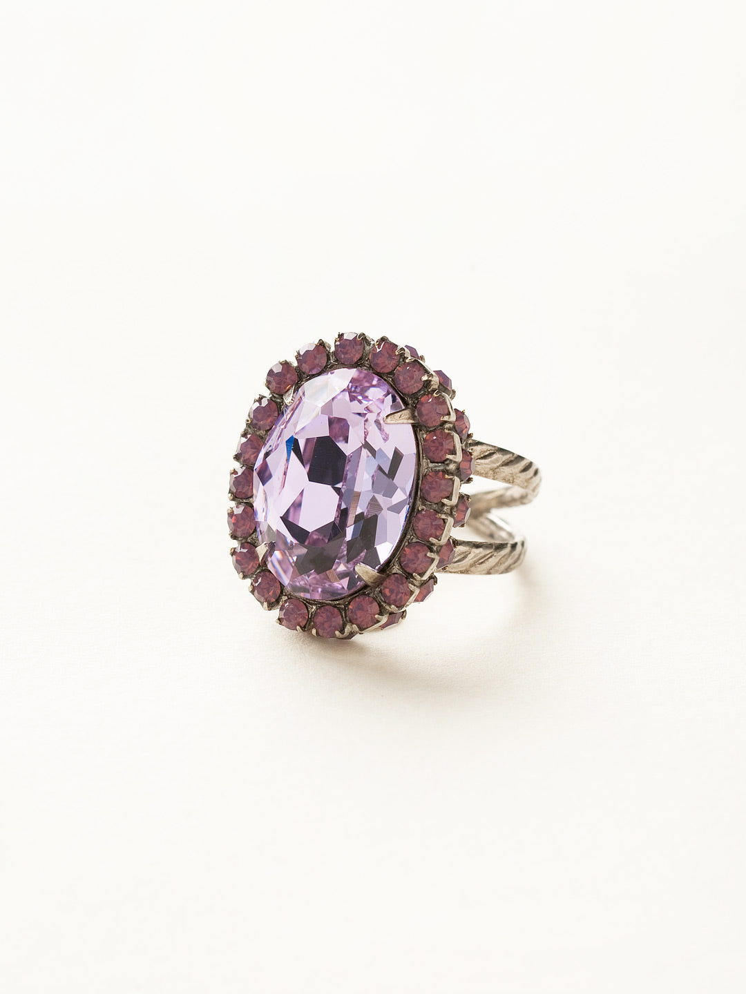 Glamorous Oval-Cut Cocktail Ring - RBT68ASVE - <p>A jewelry collection must! This glamorous ring features a bold oval cut center crystal surrounded by crystal accents that sits on a braided band to create an antique classic. Ring size: 7 (US) From Sorrelli's Violet Eyes collection in our Antique Silver-tone finish.</p>