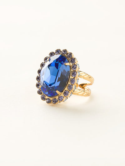 Glamorous Oval-Cut Cocktail Ring - RBT68BGSS - <p>A jewelry collection must! This glamorous ring features a bold oval cut center crystal surrounded by crystal accents that sits on a braided band to create an antique classic. Ring size: 7 (US) From Sorrelli's Sweet Sapphire collection in our Bright Gold-tone finish.</p>