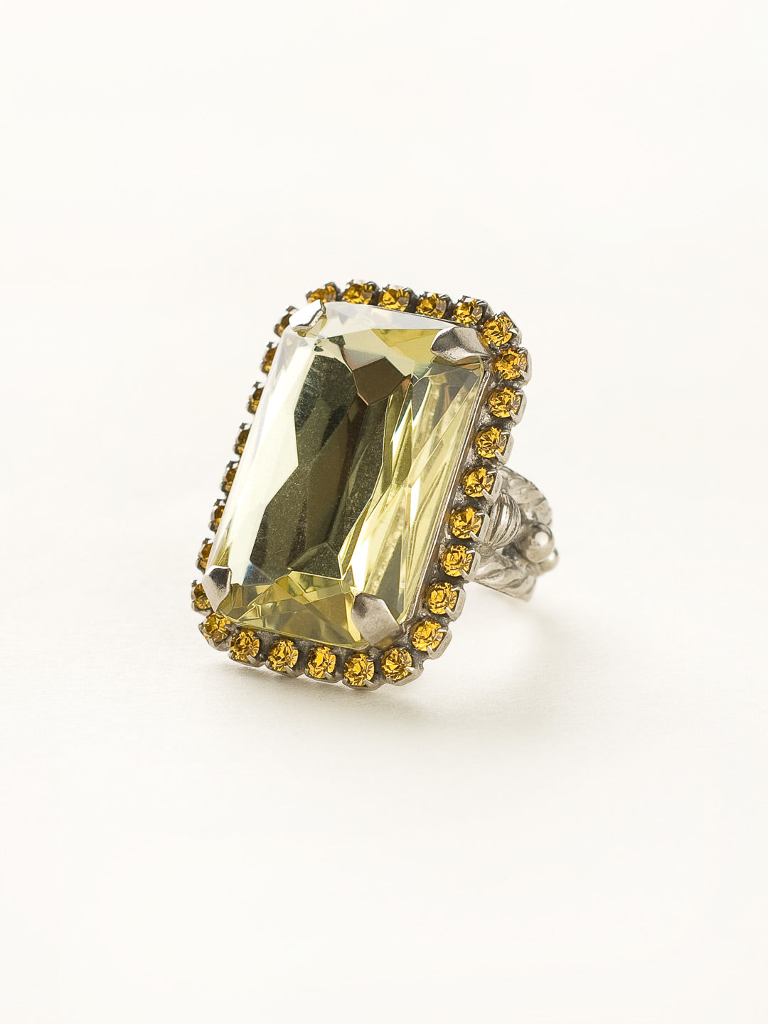 Luxurious Emerald-Cut Cocktail Ring - RBT69ASLMD - <p>Big, bold glamour! The large emerald cut crystal of this cocktail ring will leave all eyes on you! Ring size: 7 (US) From Sorrelli's Lemonade collection in our Antique Silver-tone finish.</p>