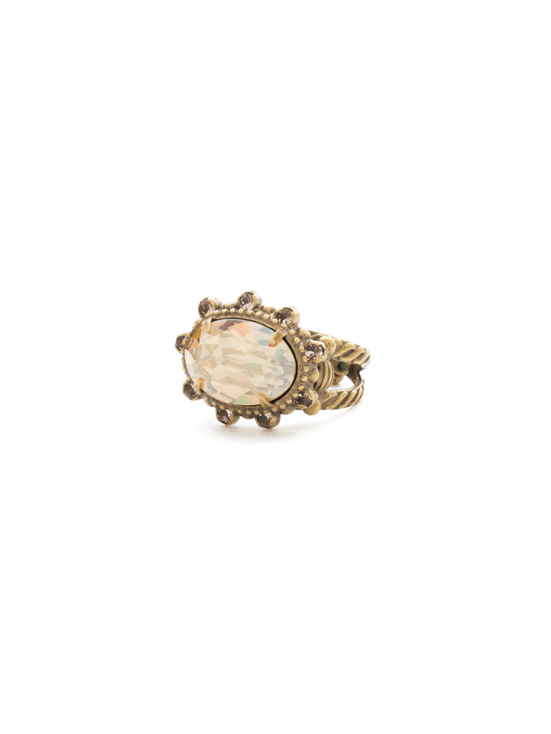 Crystal Ellipse Cocktail Ring - RCK14AGRSU - <p>Total eclipse of our hearts! This breathtaking ring features an oval center stone surrounded by smaller crystals, creating out of this world sparkle. Ring size: 7 (US) From Sorrelli's Raw Sugar collection in our Antique Gold-tone finish.</p>