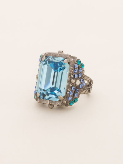 Snowflake Cocktail Ring - RCK2ASEB - <p>All around glitz and glam! This ornate cocktail ring gleams at every angle. With its elegant cushion-cut octagon crystal, you're sure to attract the eyes of many. Ring size: 7 (US) From Sorrelli's Electric Blue collection in our Antique Silver-tone finish.</p>