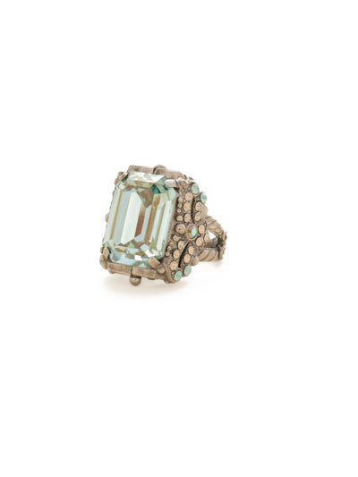 Snowflake Cocktail Ring - RCK2ASTT - <p>All around glitz and glam! This ornate cocktail ring gleams at every angle. With its elegant cushion-cut octagon crystal, you're sure to attract the eyes of many. Ring size: 7 (US) From Sorrelli's Teal Textile collection in our Antique Silver-tone finish.</p>