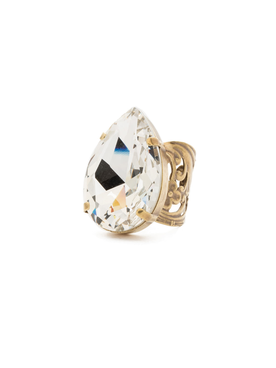 Teardrop Cocktail Ring - RCM25AGCRY - <p>This ring is a far cry from ordinary. A bold teardrop crystal set on a filigree band is the perfect dose of glitz and glamour. From Sorrelli's Crystal collection in our Antique Gold-tone finish.</p>