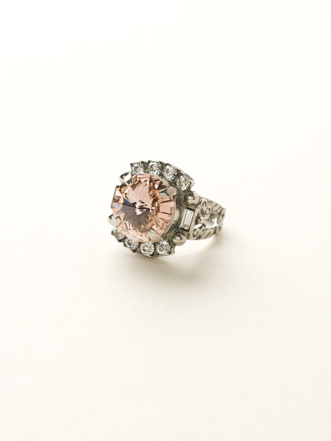 Round Crystal Encrusted Cocktail Ring - RCQ43ASCRR - <p>A large round gemstone surrounded by petite round crystals works as the focal point of this cocktail ring. Which is further accented by an ornate decorative band. Ring size: 7 (US) From Sorrelli's Crystal Rose collection in our Antique Silver-tone finish.</p>