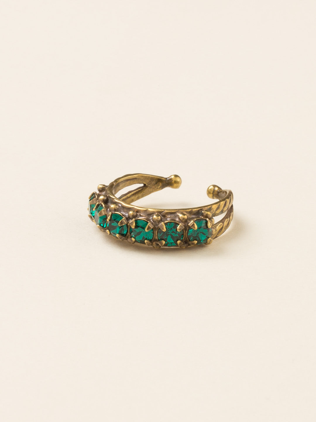 Slim Crystal Cocktail Ring - RCR111AGWFN - <p>Small round stones align in a slim ring that is perfect for stacking and layering with others! Wear one or wear some, you can never have too much sparkle! Ring size: 7 (US) From Sorrelli's Wild Fern collection in our Antique Gold-tone finish.</p>