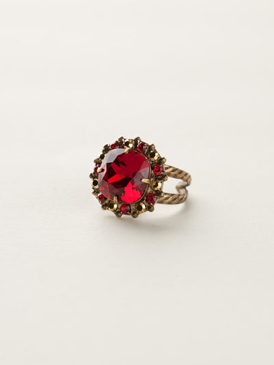 Cushion-Cut Cocktail Ring - RCR112AGGGA - <p>Simply elegant! This classic ring features a central faceted cushion-cut crystal encircled by a row of small round gemstones. Ring size: 7 (US) From Sorrelli's Go Garnet collection in our Antique Gold-tone finish.</p>