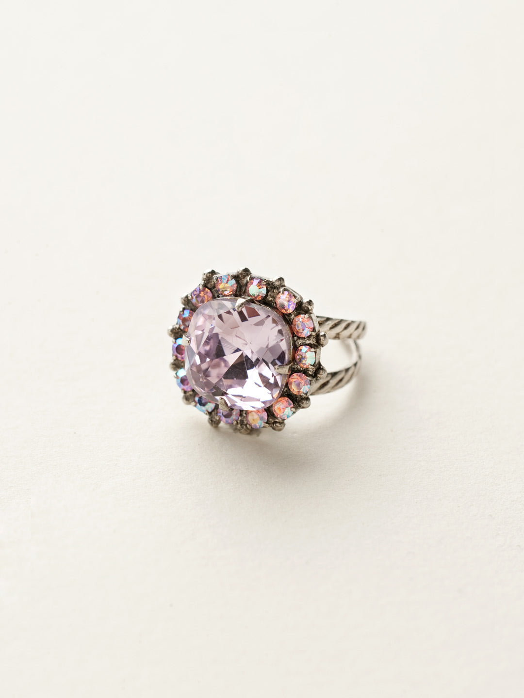 Cushion-Cut Cocktail Ring - RCR112ASSWH - <p>Simply elegant! This classic ring features a central faceted cushion-cut crystal encircled by a row of small round gemstones. Ring size: 7 (US) From Sorrelli's Sweetheart collection in our Antique Silver-tone finish.</p>