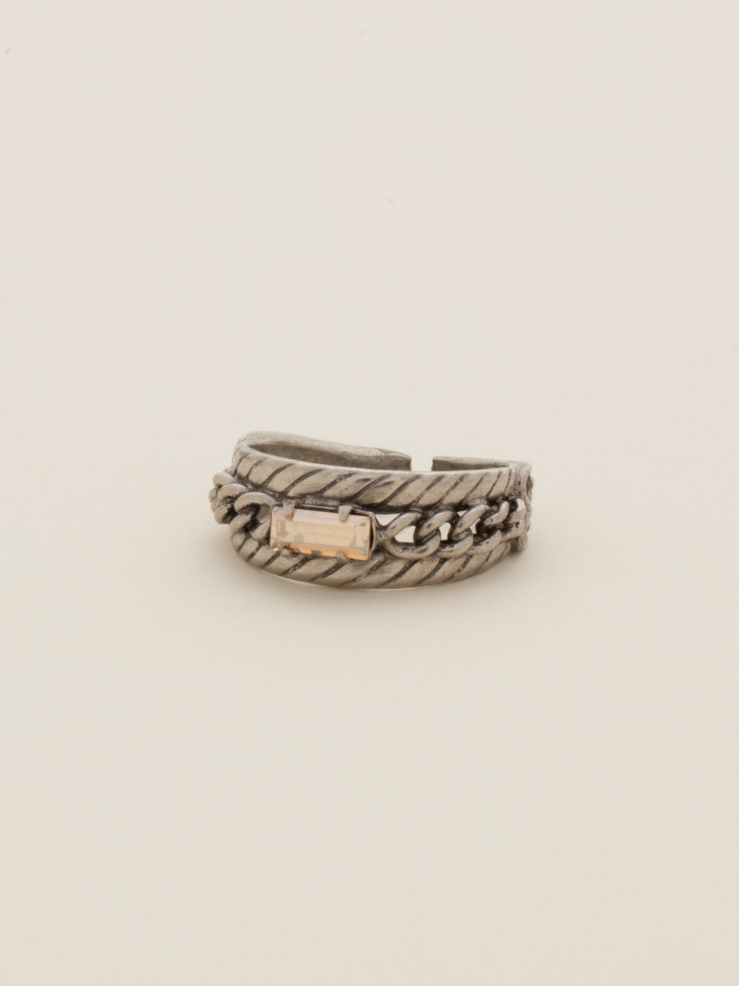 Petite Braided Baguette Cocktail Ring - RCT28ASSBL - <p>This stackable ring features a petite baguette crystal set between two braided bands, which is further accented by delicate, metal chain. Ring size: 7 (US) From Sorrelli's Satin Blush collection in our Antique Silver-tone finish.</p>