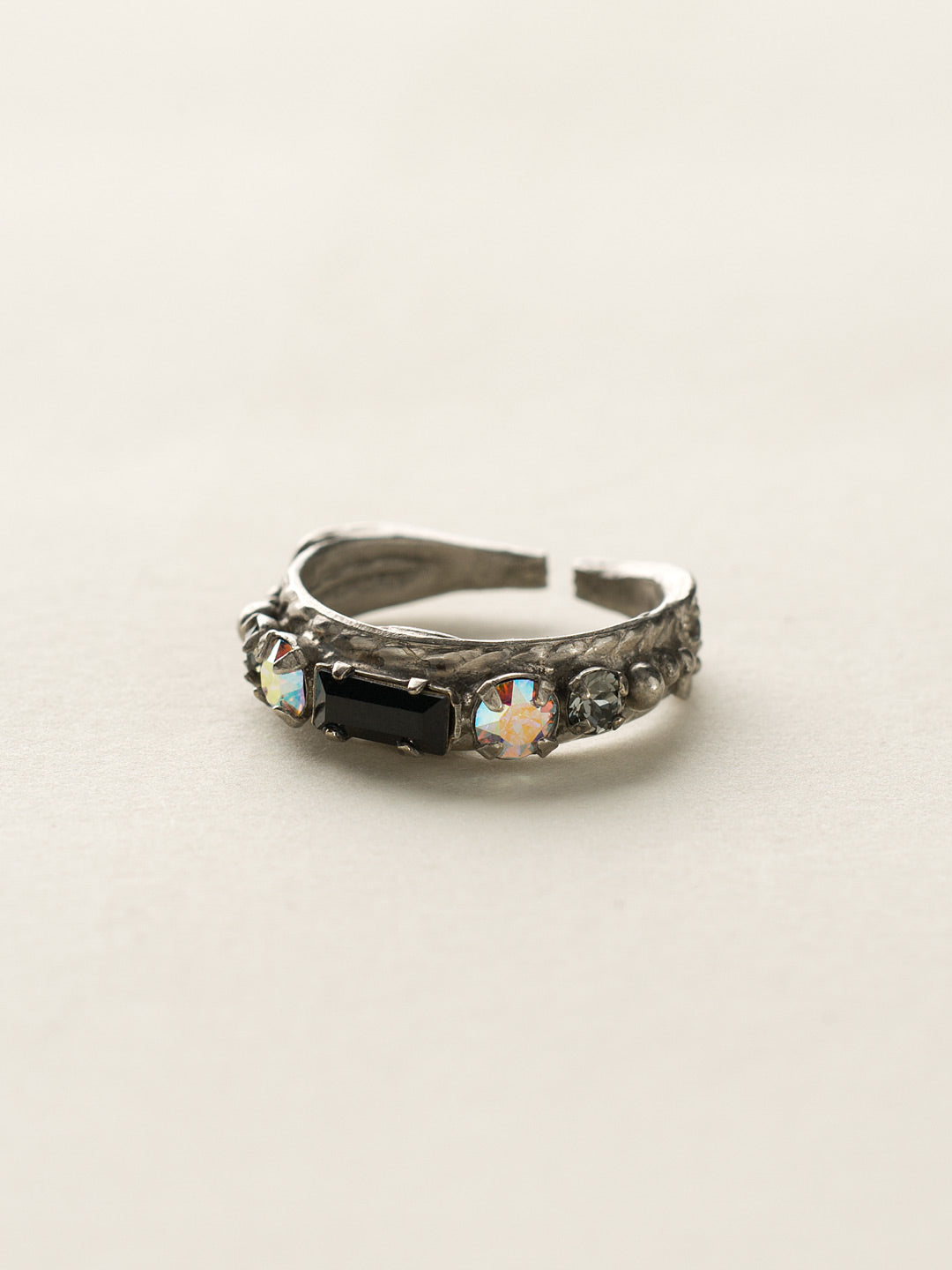 Petite Stackable Baguette Crystal Cocktail Ring - RCT3ASEM - <p>A baguette crystal is the center piece of this petite stackable ring. Wear this ring alone for a touch of sparkle, or pair it with our other petite stackables to a create a modern, stacked look. Ring size: 7 (US) From Sorrelli's Evening Moon collection in our Antique Silver-tone finish.</p>