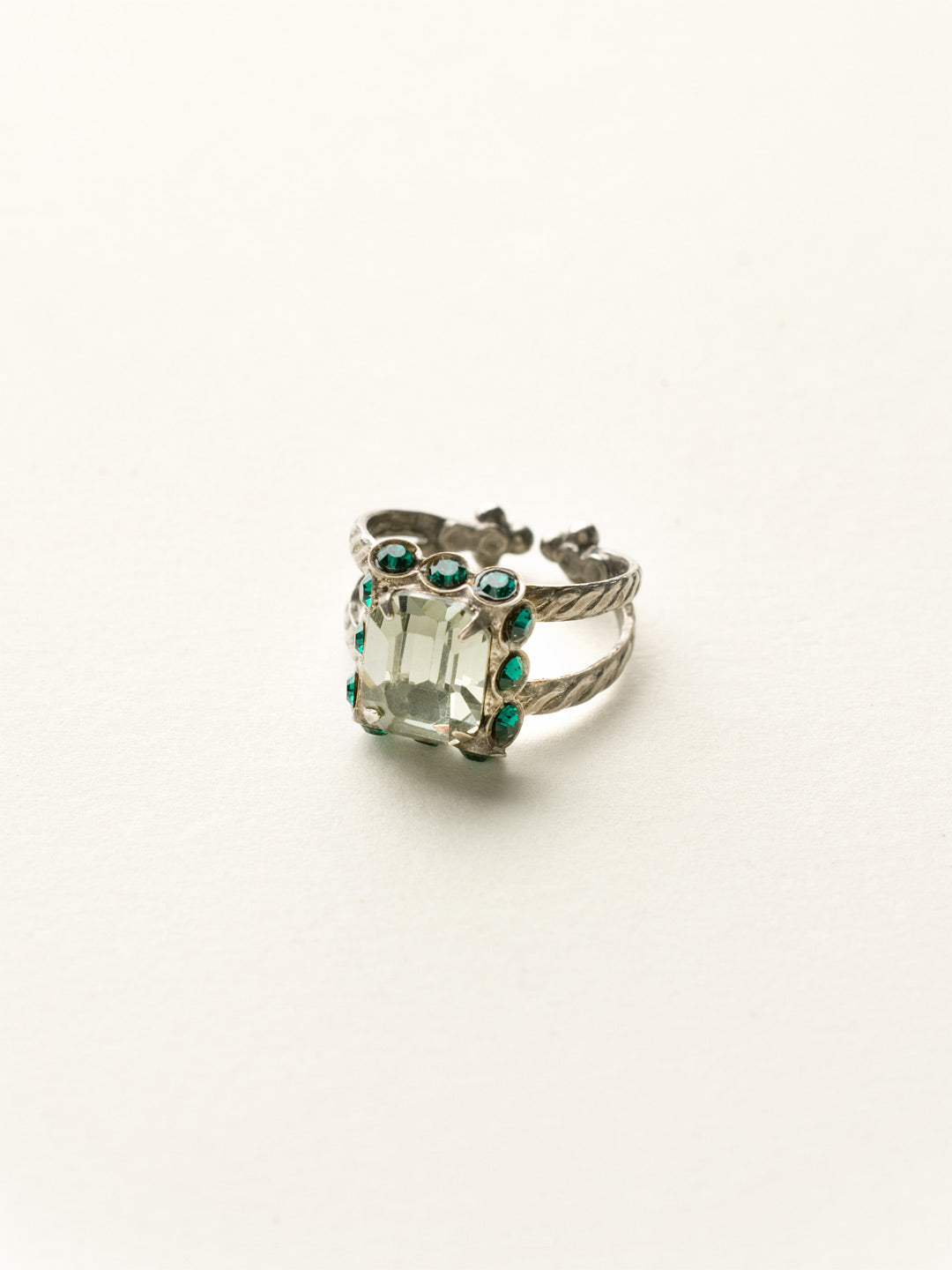 Emerald Frame Crystal Cocktail Ring - RCW52ASVR - <p>Picturesque beauty! This ring features a singular emerald cut crystal center surrounded by rows of round gems in an antique inspired setting. Ring size: 7 (US) From Sorrelli's Viridescence collection in our Antique Silver-tone finish.</p>