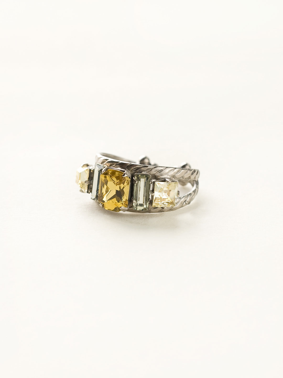 Geometric Crystal Double Band Cocktail Ring - RDA2ASLMD - <p>Emerald-cut, baguette, and square crystals all sit in a row on this geometric ring. A braided double band features a decorative metal design. Ring size: 7 (US) From Sorrelli's Lemonade collection in our Antique Silver-tone finish.</p>