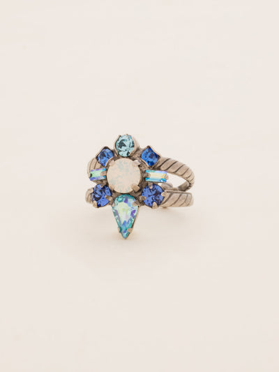 Round Crystal Starburst Cocktail Ring - RDB5ASEB - <p>A cluster of round, teardrop, and baguette cut crystals sit center on this starburst shaped ring. Ring size: 7 (US) From Sorrelli's Electric Blue collection in our Antique Silver-tone finish.</p>