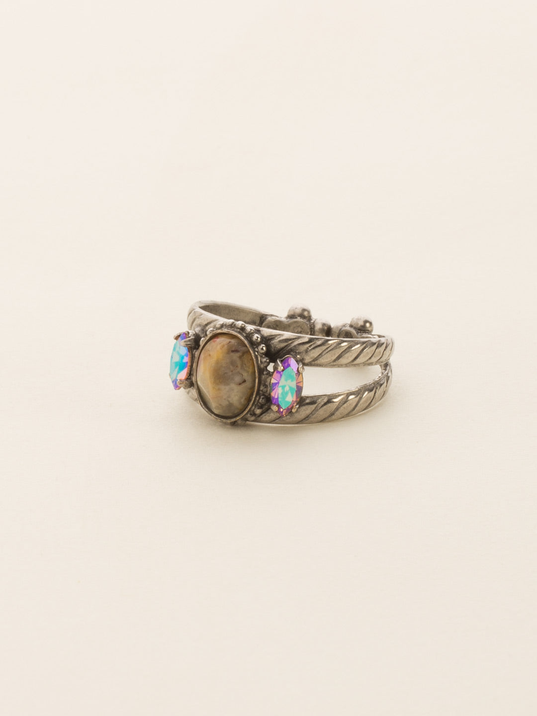 Semi-Precious and Crystal Cocktail Ring - RDE47ASSND - <p>This ring features a semi-precious oval stone set between two navette crystals. Due to the nature of natural, semi-precious stones, variations in color and pattern may occur. These variations make each Sorrelli piece one-of-a-kind! Ring size: 7 (US) From Sorrelli's Sand Dune collection in our Antique Silver-tone finish.</p>